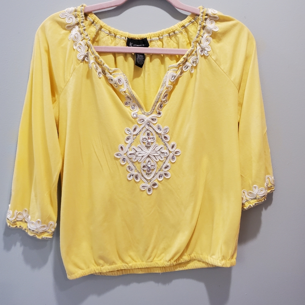 Inc yellow top with silver embellishment